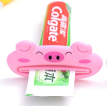 Load image into Gallery viewer, 1pcs Animal Easy Toothpaste Dispenser Plastic Tooth Paste Tube Squeezer Useful Toothpaste Rolling Holder For Home Bathroom
